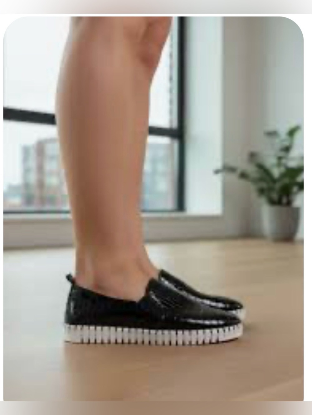 Isle Jacobsen Women's Black Slip-On Loafers with Contrasting White Ribbed Sole